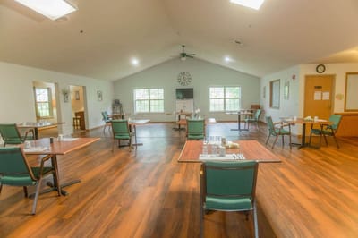 Bright dining room with tables and chairs