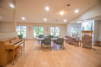 Bright common area with seating and windows
