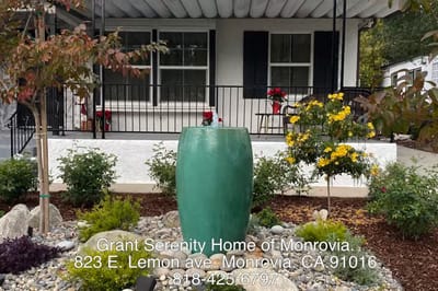 Exterior view of Grant Serenity Home with garden