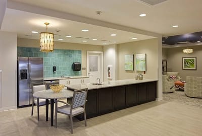 Bright interior common area with seating and decor