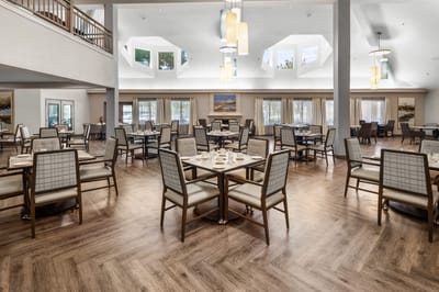 Bright dining area with tables and chairs