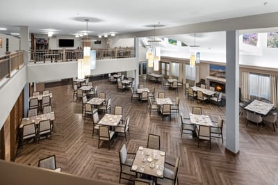 Dining area with tables set for a meal