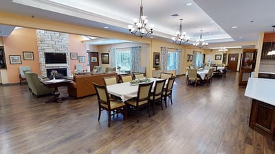 Bright dining area with tables and chairs