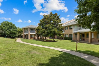 Outdoor view of a landscaped area with buildings