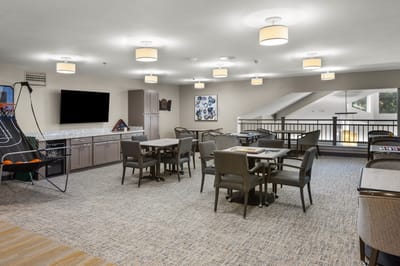 Interior common area with seating and activities
