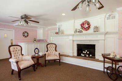 Cozy common area with vintage chairs and decor