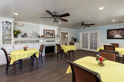 Bright dining area with tables set for meals