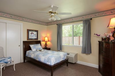 Cozy private room with bed and window view