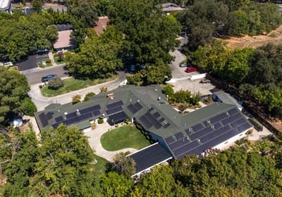 Aerial view of the assisted living facility with gardens