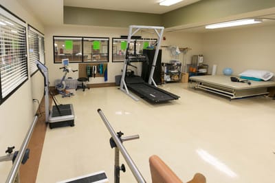 Interior view of a therapy room with equipment