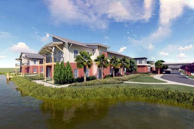Exterior view of Azalea Estates surrounded by greenery
