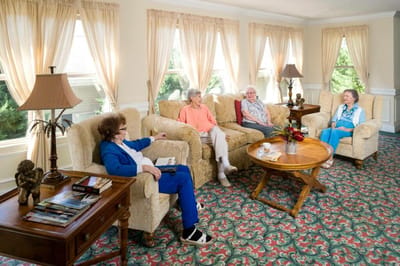 Residents enjoying conversation in a common area