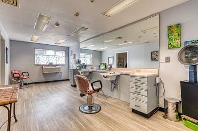 Interior view of a hair salon space in the facility