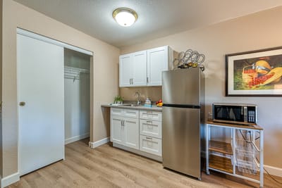 A kitchenette area in a resident room