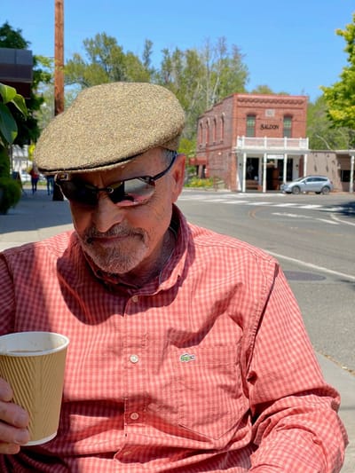 Senior man enjoying coffee outdoors