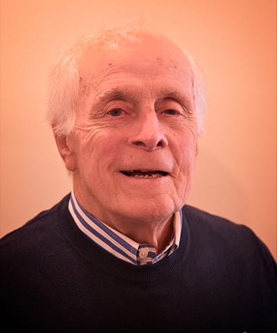 Portrait of an elderly man smiling at the camera