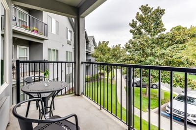 Balcony view of a senior living facility with outdoor space
