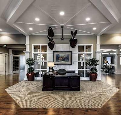 Interior lobby area with open space and reception desk
