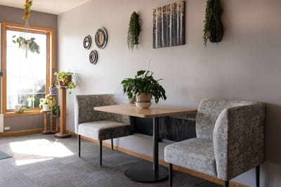 Cozy common area with plants and seating