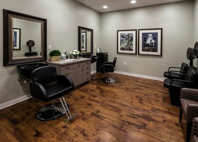 Interior view of a hair salon with styling chairs