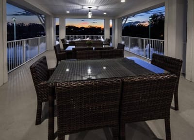 Outdoor seating area with a view at sunset