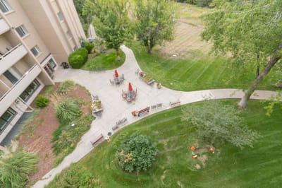 Aerial view of outdoor seating area with gardens