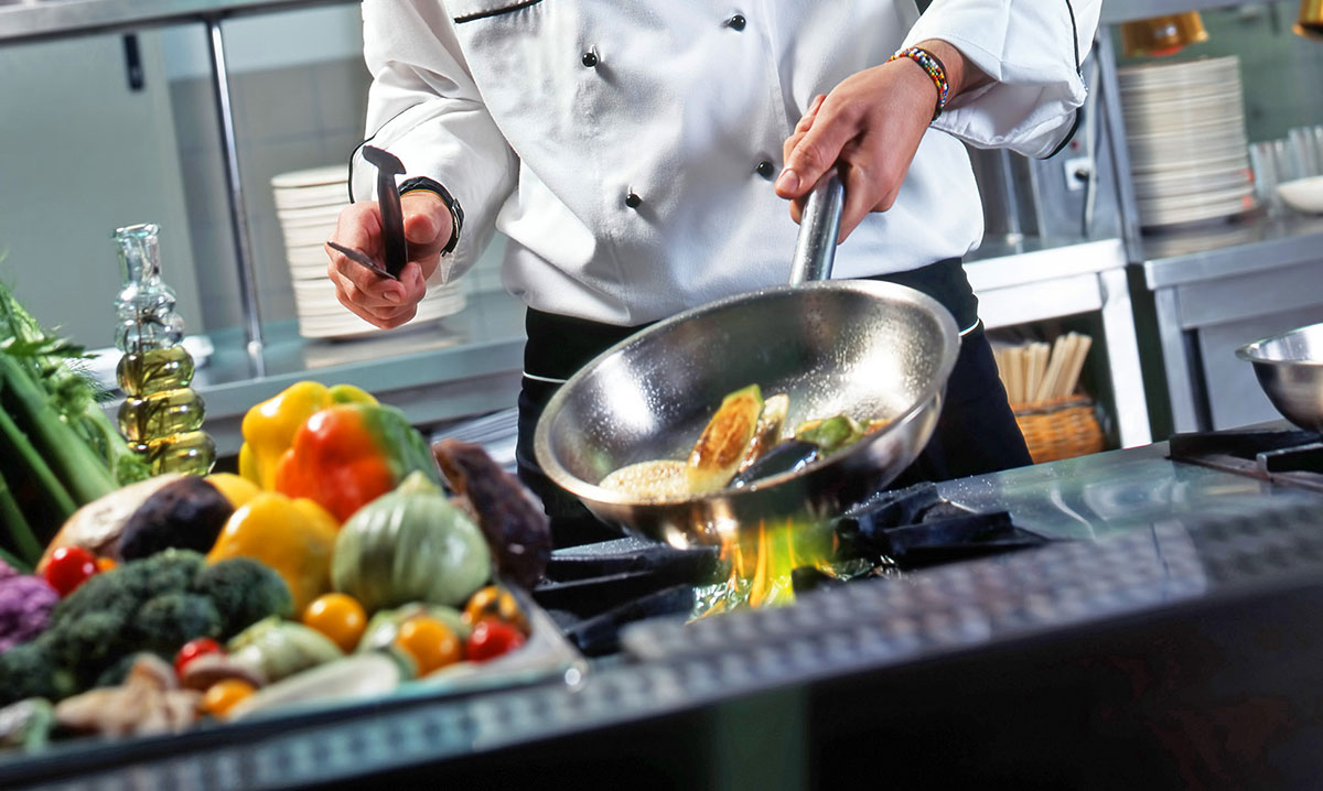 Chef preparing food in a kitchen