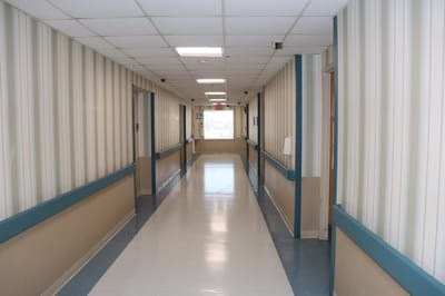 Bright corridor in a nursing facility with patterned walls