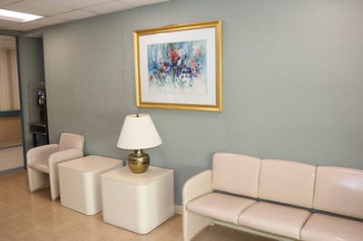 Interior view of a lounge with seating and art
