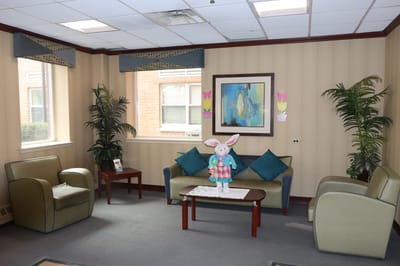 Bright common area with seating and decor
