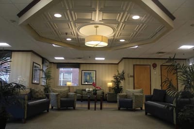 Interior lounge area with comfortable seating and plants