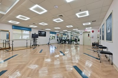 Interior view of a gym area with exercise equipment