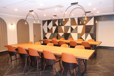 Modern common area with stylish seating and lights