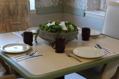 Dining table set with utensils and decoration