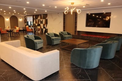 Modern common area with seating in a lounge space