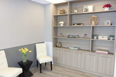 Cozy interior lounge area with decorative shelf and seating