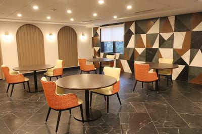 Bright common area with modern furniture and decor