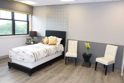 Well-furnished resident room with modern decor