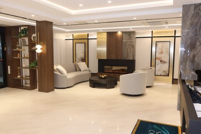 Bright common area with modern seating and decor