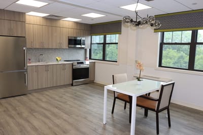 Bright and contemporary kitchen area in a resident apartment