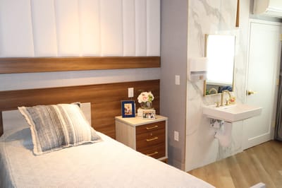 Cozy resident room with single bed and decor