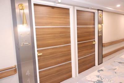 Private resident rooms' doors in a hallway