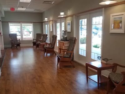 Bright interior common area with rocking chairs