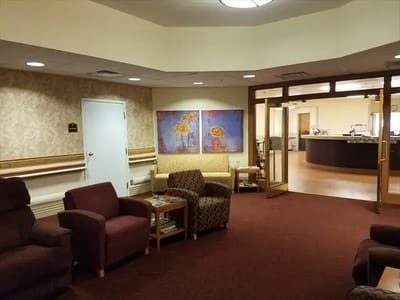 Common area lounge with seating and artwork