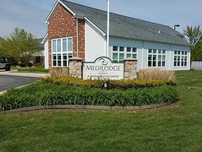 Front view of Medilodge of Monroe building with signage
