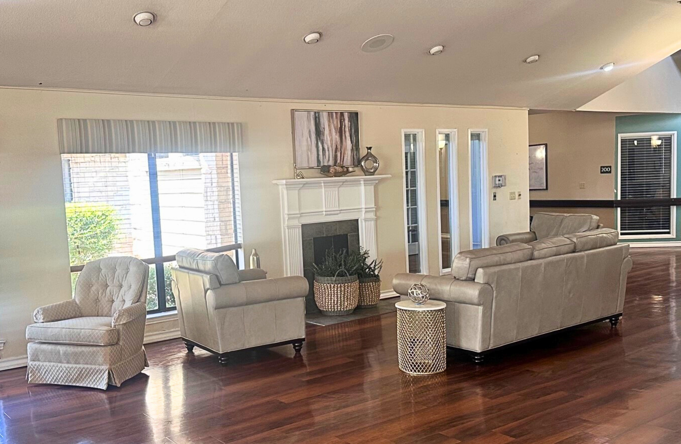 Interior common area with seating and fireplace