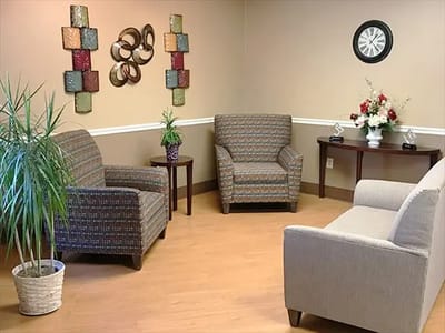 Cozy interior lounge area with chairs and decor