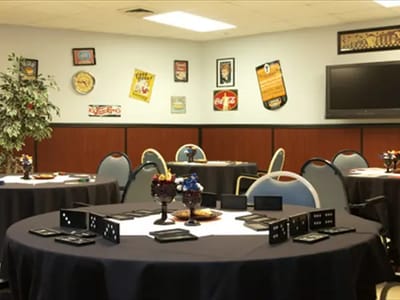 Interior view of a decorated common area with tables