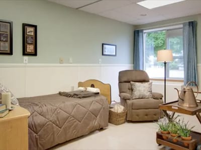 Comfortable private resident room with seating area