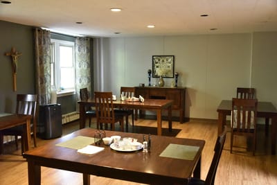 Bright interior common area with tables and chairs
